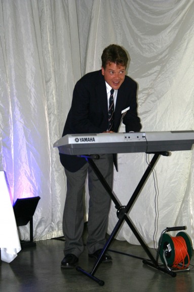 “Rock and Roll legend “Devious Nevius” entertained at the United States Roberts Team Banquet.   Surrey constables were called in to provide extra security until it was announced that, “Kevin has left the building!”  Fortunately the Lord Roberts Centre, site of the affair,  sustained no damage from the hoards of groupies crashing the gates at Bisley, avoiding an ugly international incident.”