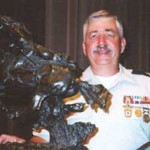 Greg Tomsen with the Black Hawk Trophy in 2002. Photo courtesy of Black Hawk Rifle Club